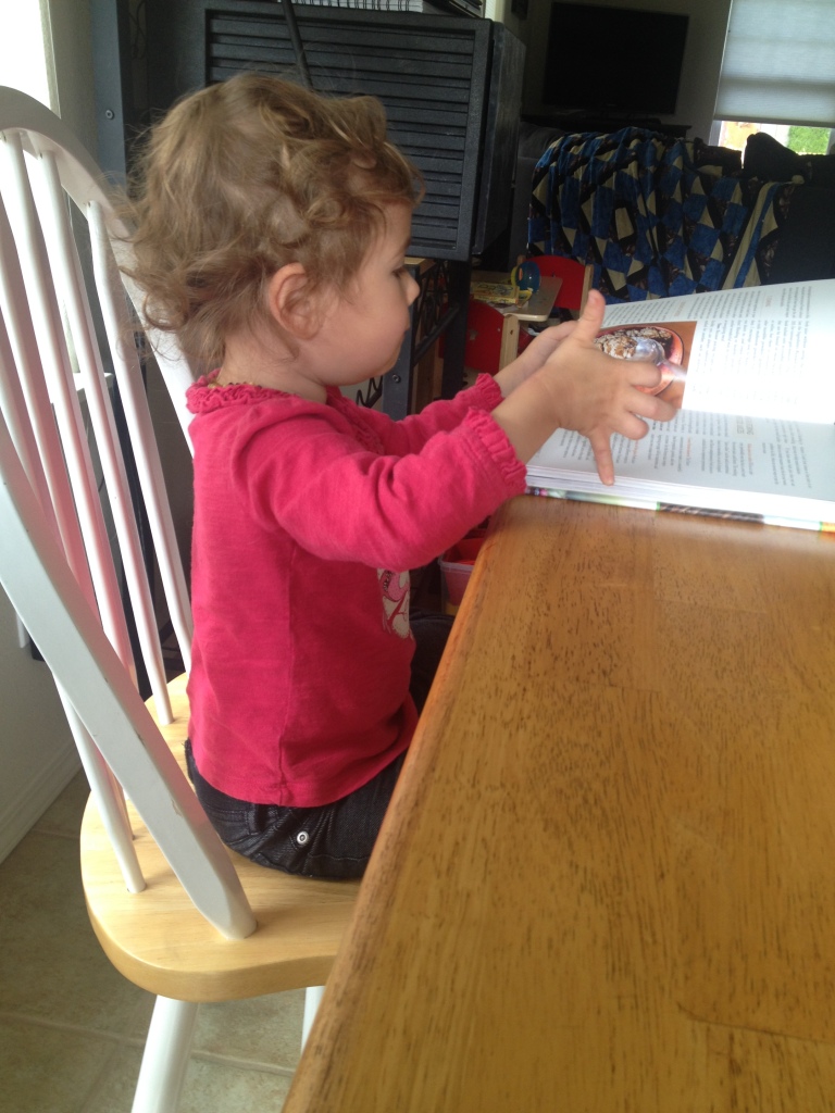 Our little herbivore thumbing through the Superfood Juices book!
